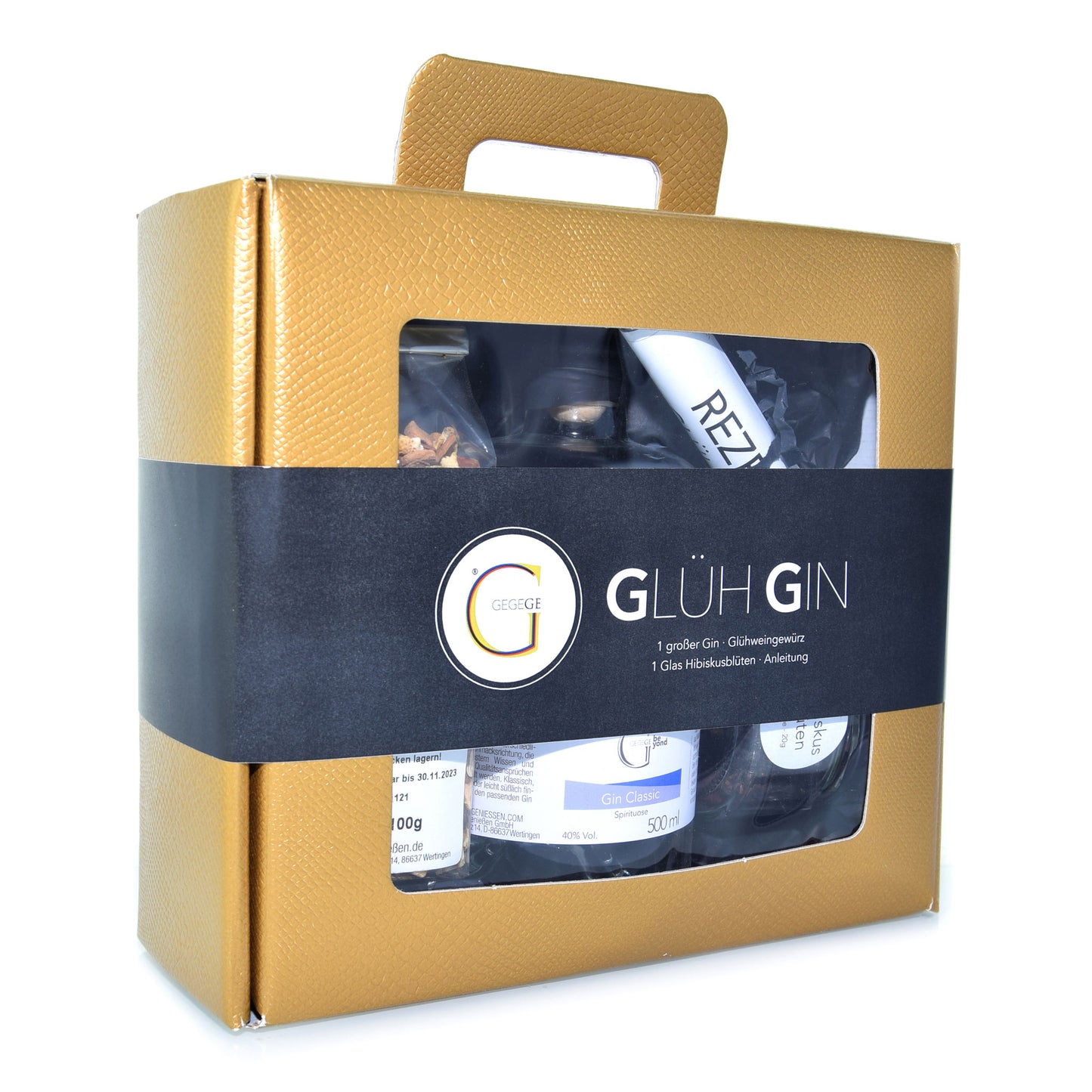 Winterliches Glüh Gin Geschenkset von Genial Genießen mit Gin, Glühweingewürz, Hibiskusblüten und Rezeptkarte in hochwertiger Geschenkverpackung zum Selbermachen eines fruchtig würzigen Heißgetränks.