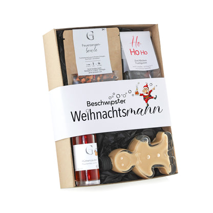 Genial Genießen Beschwipster Weihnachtsmann Geschenkset mit winterlichen Spezialitäten, feinen Leckereien und ausgewählten Genussprodukten in festlicher Weihnachtsverpackung.