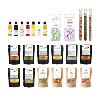 Hochwertiges Adventskalender-Set von Genial Genießen für Kochliebhaber mit abwechslungsreichen Zutaten und Feinkostprodukten für kreative Gerichte in der Weihnachtszeit.