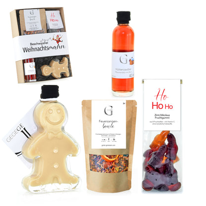 Weihnachtliches Genial Genießen Geschenkset „Beschwipster Weihnachtsmann“ mit Likör, süßen Köstlichkeiten und saisonalen Delikatessen als besondere Geschenkidee für die Adventszeit.