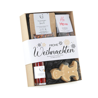 Edles Genial Genießen Weihnachtsgeschenk mit ausgewählten Delikatessen und weihnachtlichen Genussprodukten in hochwertiger Geschenkverpackung.
