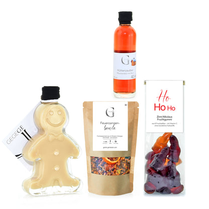 Liebevoll zusammengestelltes Weihnachtsgeschenk von Genial Genießen mit feinen Delikatessen und saisonalen Spezialitäten für eine kleine, genussvolle Weihnachtsfeier.