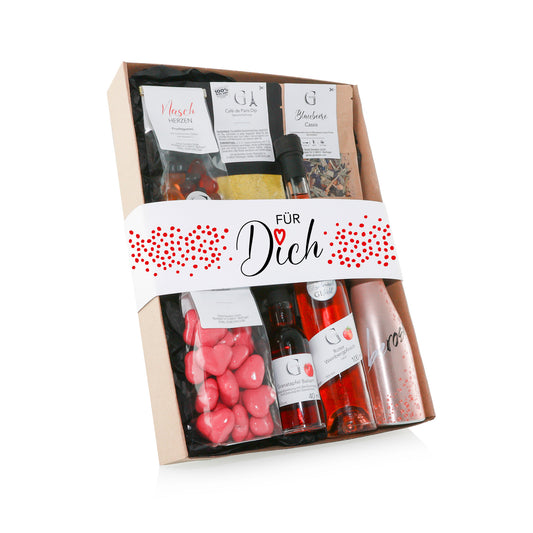 Geschenkset „Für Dich“ von Genial Genießen mit ausgewählten Feinkostspezialitäten wie Fruchtgummis, Tee, Likör, Secco sowie Balsamico und Dip-Gewürz für besondere Genussmomente voller Wertschätzung.