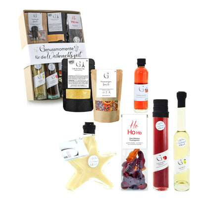 Weihnachtliches Genial Genießen Geschenkset „Genussmomente Weihnachtszeit“ mit hochwertigen Delikatessen und liebevoll zusammengestellten Köstlichkeiten.