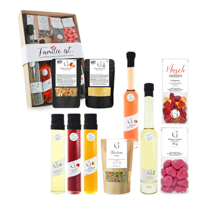 Geschenkset „Familie, Genuss, Liebe“ von Genial Genießen mit einer großen Auswahl an Feinkostspezialitäten wie Ölen, Balsamico, Gewürzen, Tee und süßen sowie herzhaften Genussmomenten für gemeinsame Zeit mit der Familie.