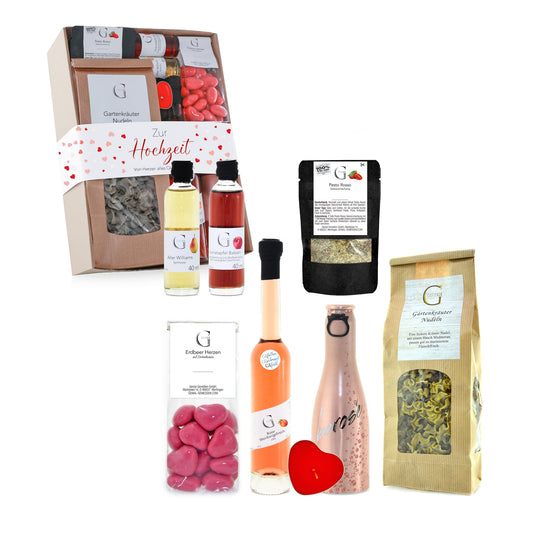 Hochwertiges Hochzeits Geschenkset von Genial Genießen mit fruchtigen Likören, Secco, Gewürzen, Nudeln und süßen Feinkostspezialitäten für das Brautpaar