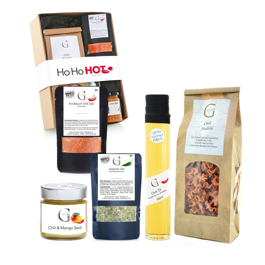 Weihnachtliches GeGeGe HoHoHot Geschenkset von Genial Genießen mit pikanten Spezialitäten, scharfen Delikatessen und festlicher Verpackung für besondere Genussmomente.