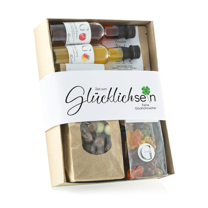 Zeit zum Glücklichsein Geschenkset von Genial Genießen mit Likören, Fruchtgummis, Balsamico, Kräutertee und süßen Feinkostspezialitäten in Geschenkbox